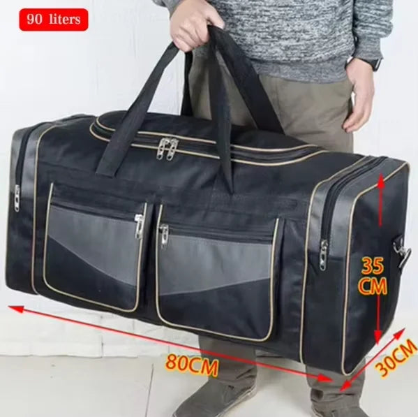 Large black travel duffel bag from Corporación Turística, ideal for camping, gym, or travel with spacious design.