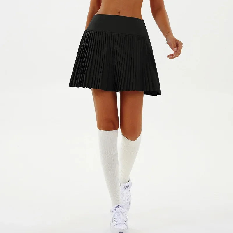 Black sexy yoga shorts with a pleated skirt for fitness, from Corporación Turística, shown in XL size.