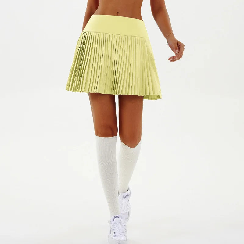 Black sexy yoga shorts with a pleated skirt design from Corporación Turística, ideal for fitness and active wear.