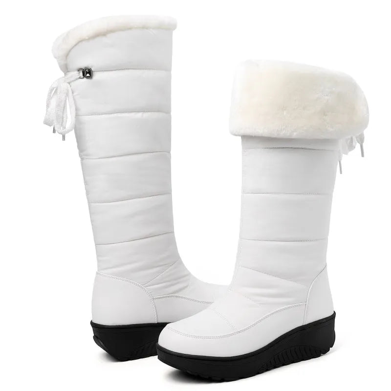 Impermeable winter boots for women by Corporación Turística in white, stylish and suitable for snowy weather.