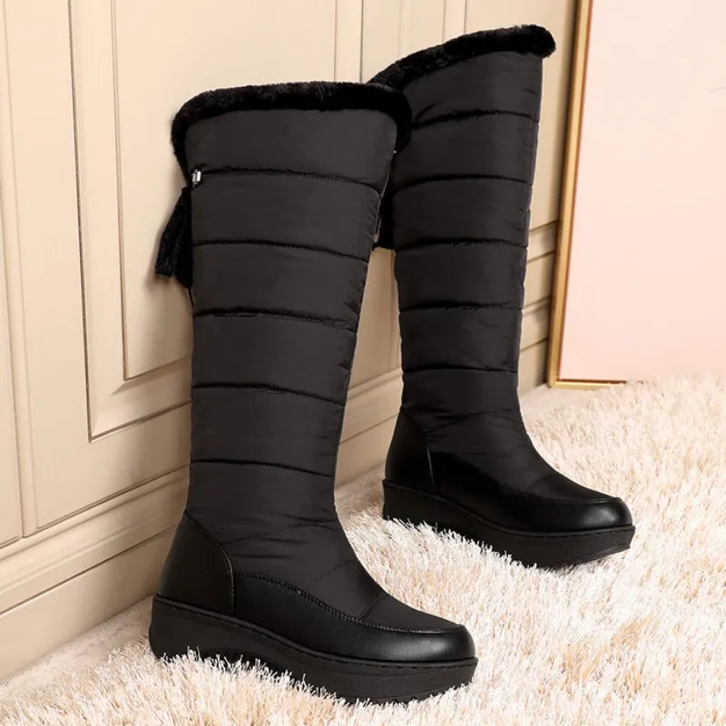 Impermeable winter women's boots by Corporación Turística in white, stylish and suitable for snowy weather conditions.