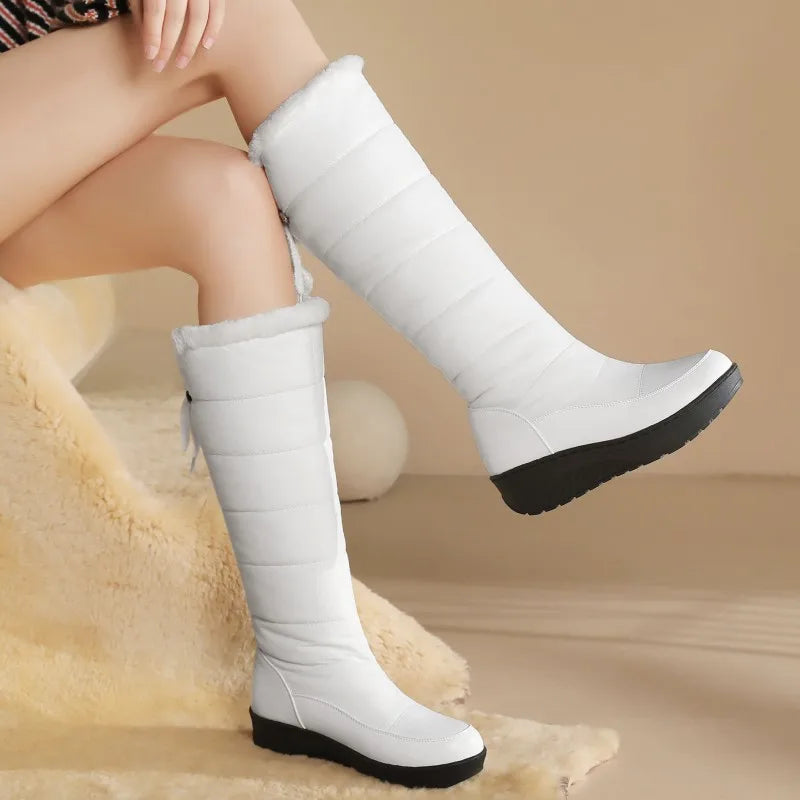 Impermeable winter boots for women in white, waterproof footwear by Corporación Turística, suitable for snowy weather.