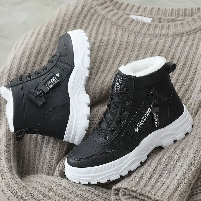 Winter women's shoes by Corporación Turística, white lace-up sneakers with cozy insulation and durable rubber soles.