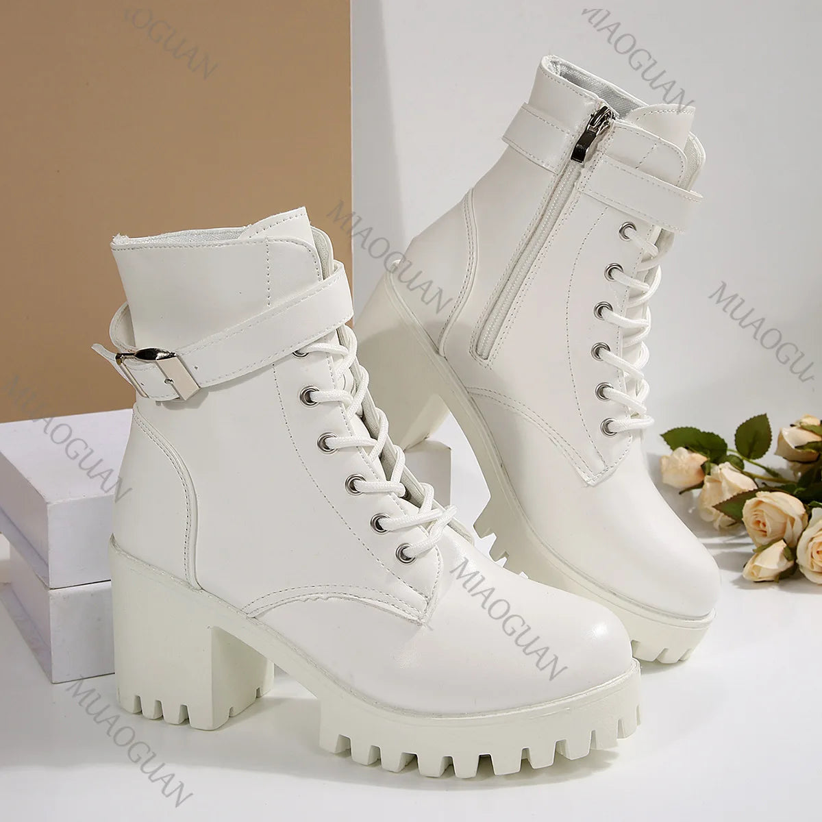 Black women's fall and winter boots with buckle detail, stylish and new, perfect for chilly weather from Corporación Turística.