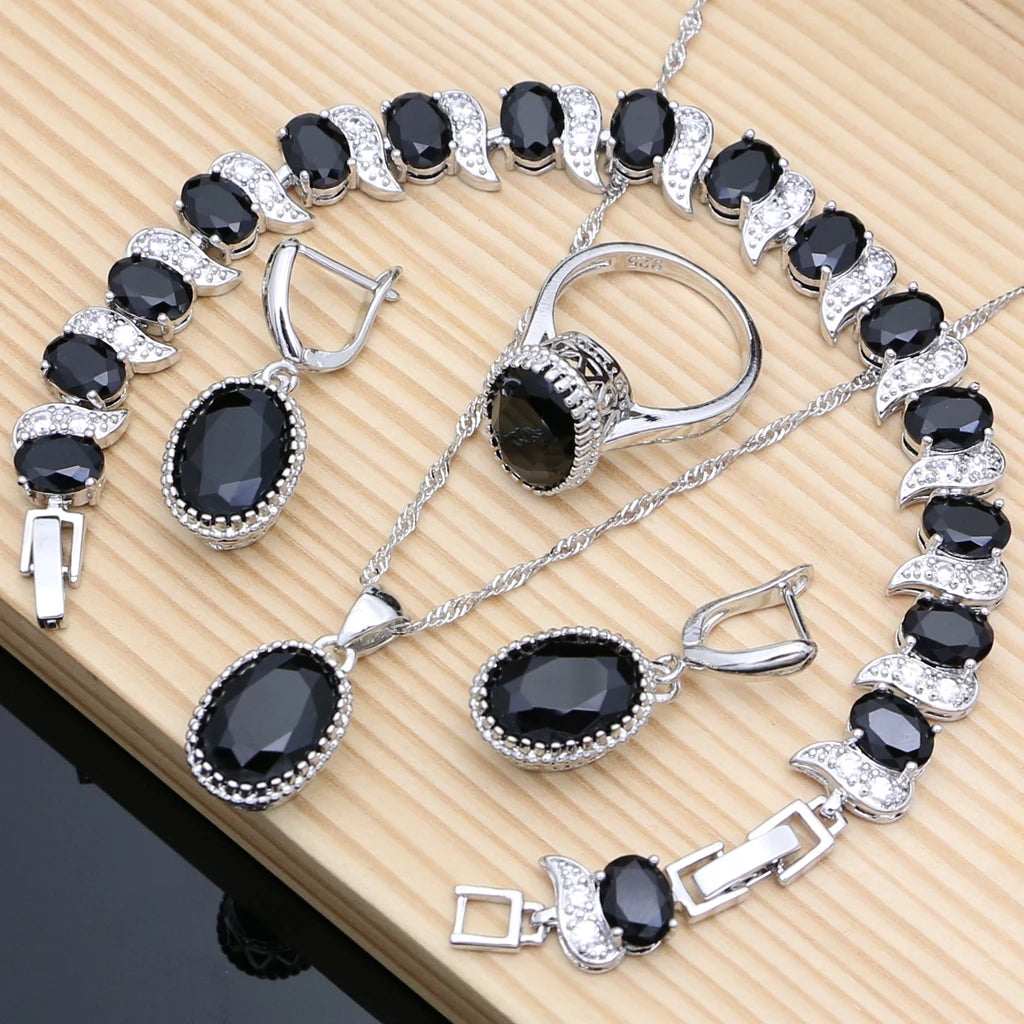 Silver 925 jewelry set for women including earrings and pendant, natural silver finish, elegant and stylish.