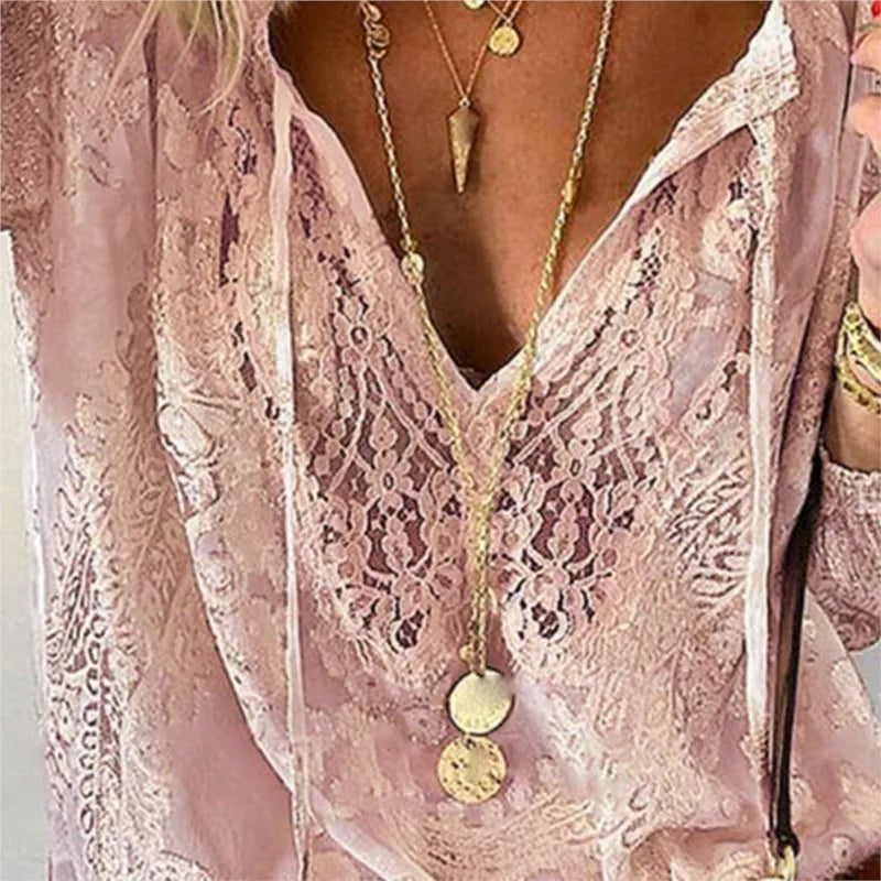 White women's boho lace blouse for spring and summer, featuring a relaxed, airy style with ruffled details from Corporación Turística.
