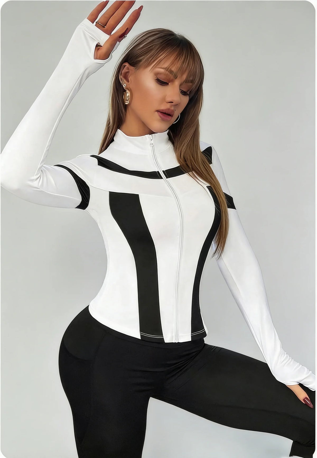 Long-sleeve athletic sports shirt with high collar in cream color by Corporación Turística, designed for active wear.