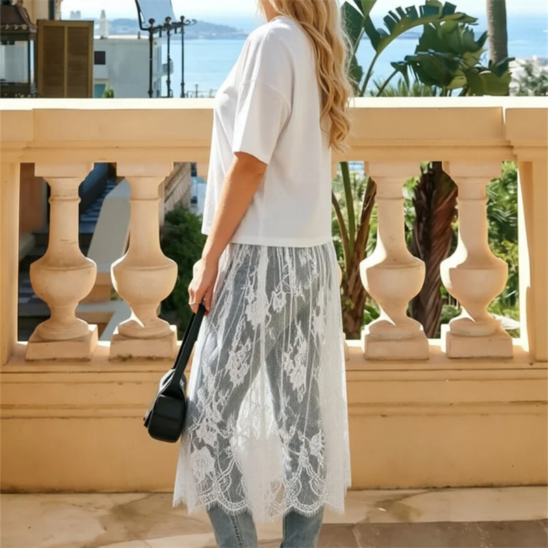 Casual women's dress with 3/4 sleeves, loose fit, white color, from Corporación Turística, featuring a round neckline.
