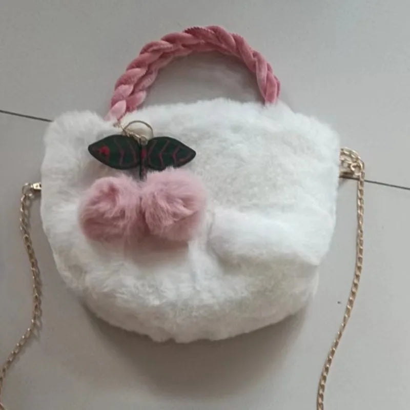 White fashion handbags for women by Corporación Turística featuring plush hand-held purse with soft, cozy fabric design.