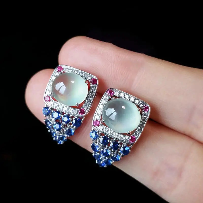 Red calcedonia earrings with round, ice-hue stones, featuring natural gemstone design, from Corporación Turística.