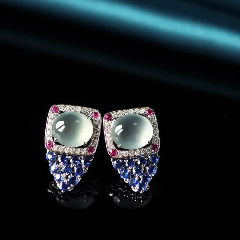 Red round calcedonia earrings with icy egg-shaped stones, natural and elegant jewelry by Corporación Turística.