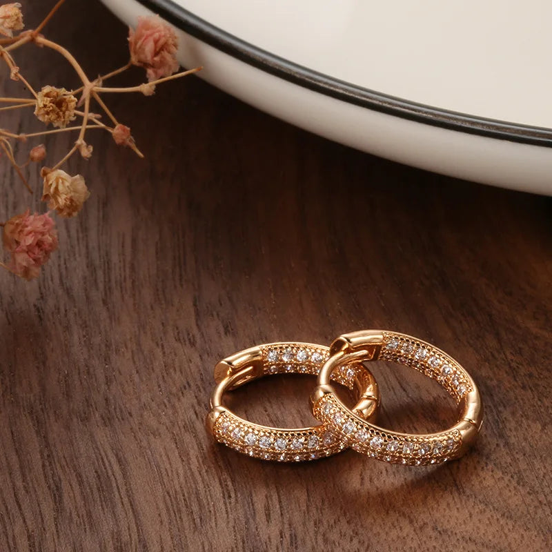 14k gold diamond earrings for women featuring elegant design, showcasing sparkling diamonds in a classic jewelry style.