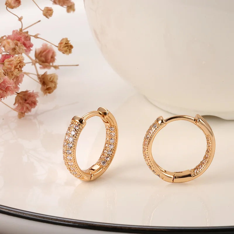 14k gold diamond earrings for women, elegant jewelry with sparkling diamonds, featuring a classic design and high-quality craftsmanship.