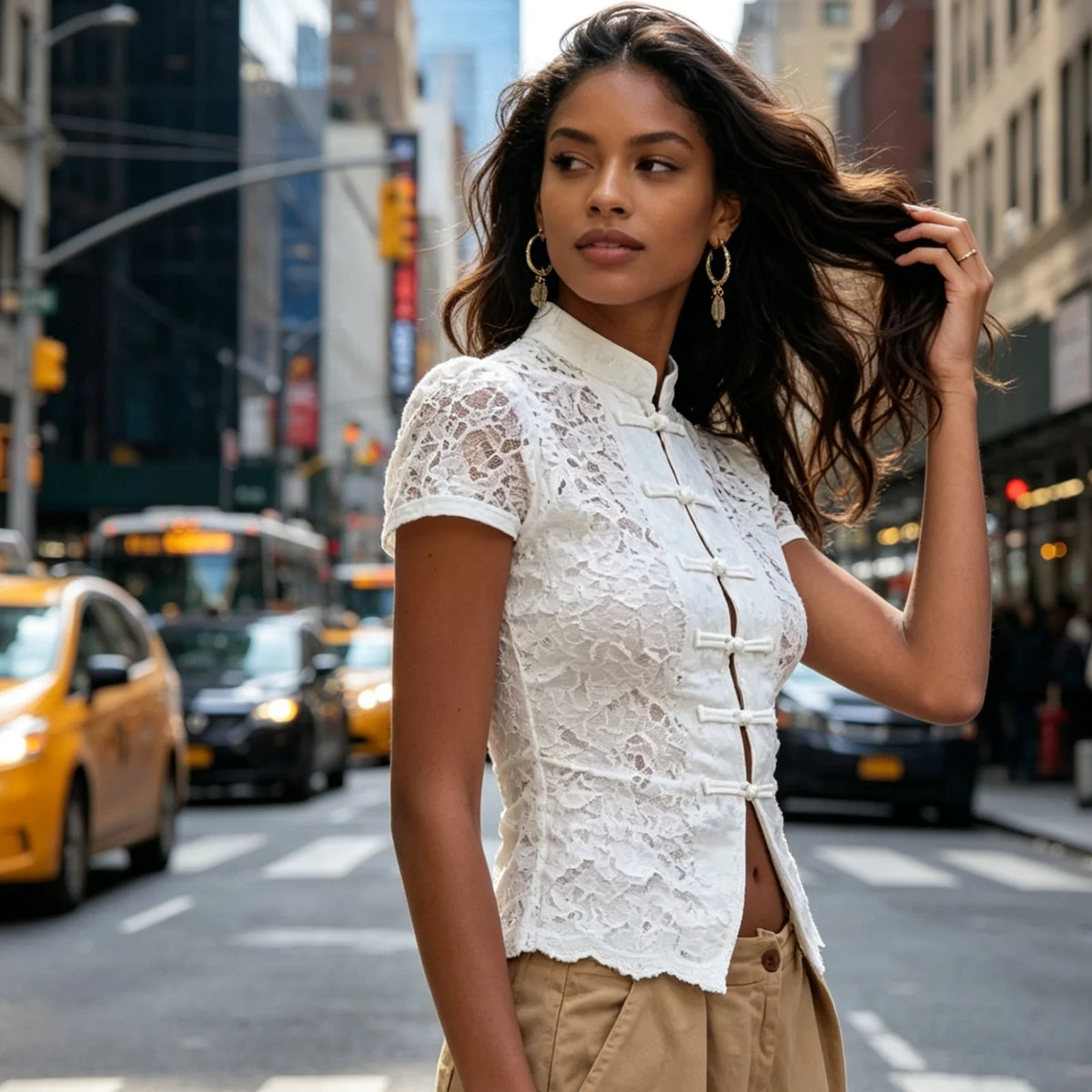 White women's summer short-sleeve shirt with a collar from Corporación Turística, designed for warm weather and casual wear.