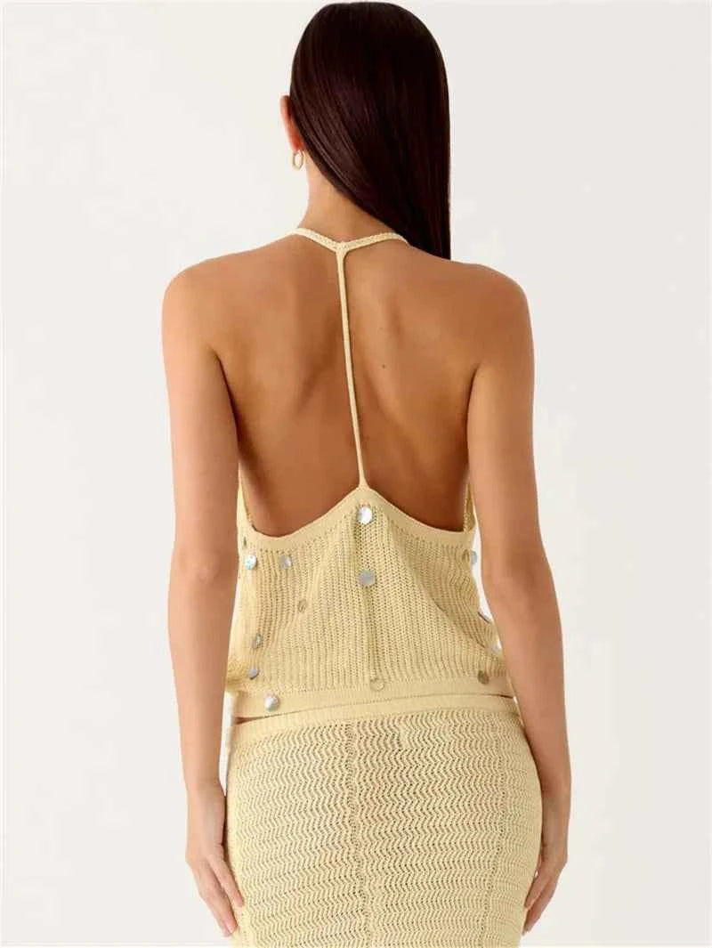 Elegant white women's bodycon skirt and top set with sequin embellishments, perfect for stylish evening wear.