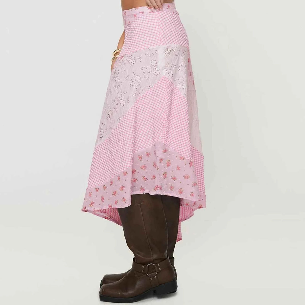 White women's midi flared skirt with lace and irregular hem, flowing and stylish for elegant casual wear.