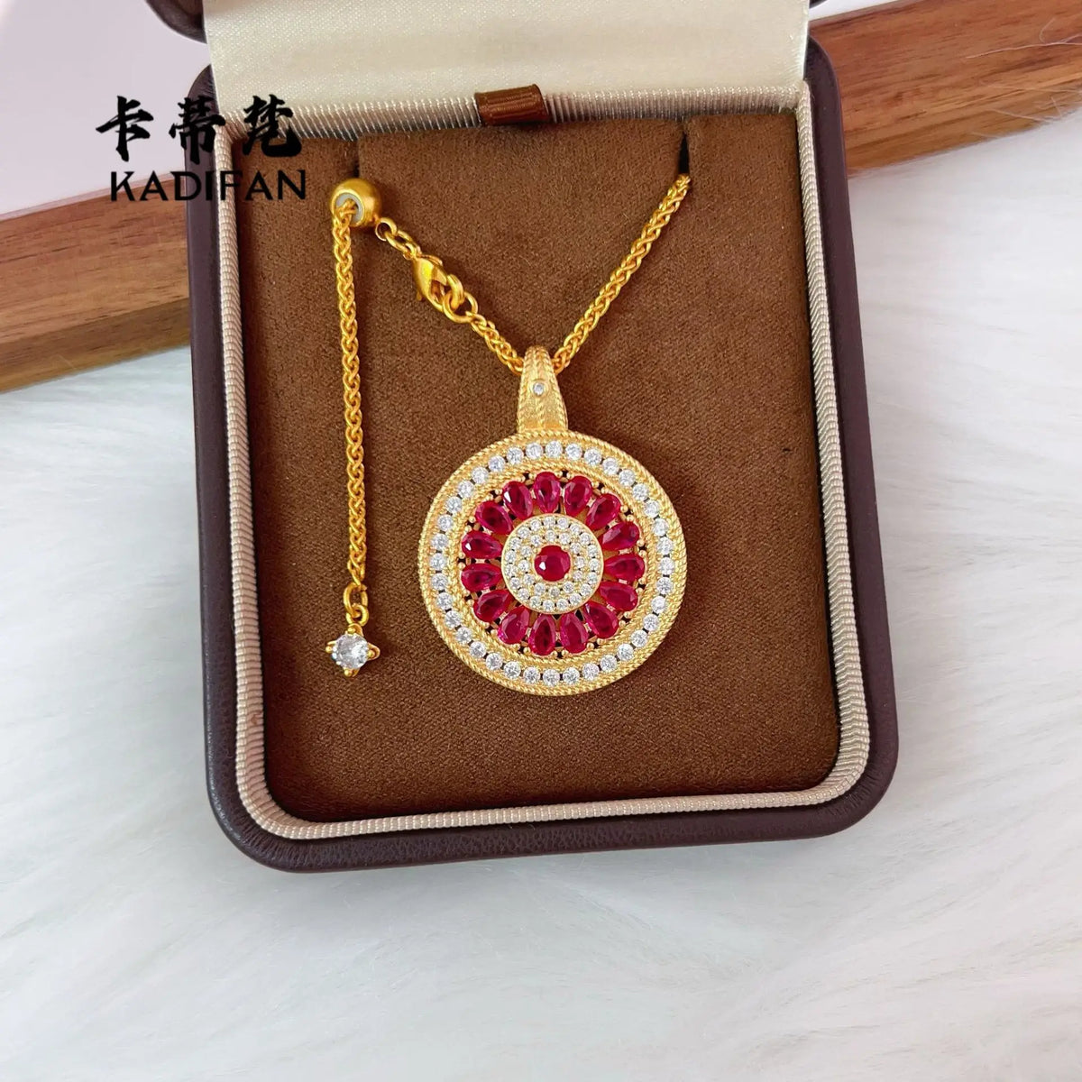 Real 24K rose gold window pendant from a jewelry store, featuring a delicate design and polished finish.