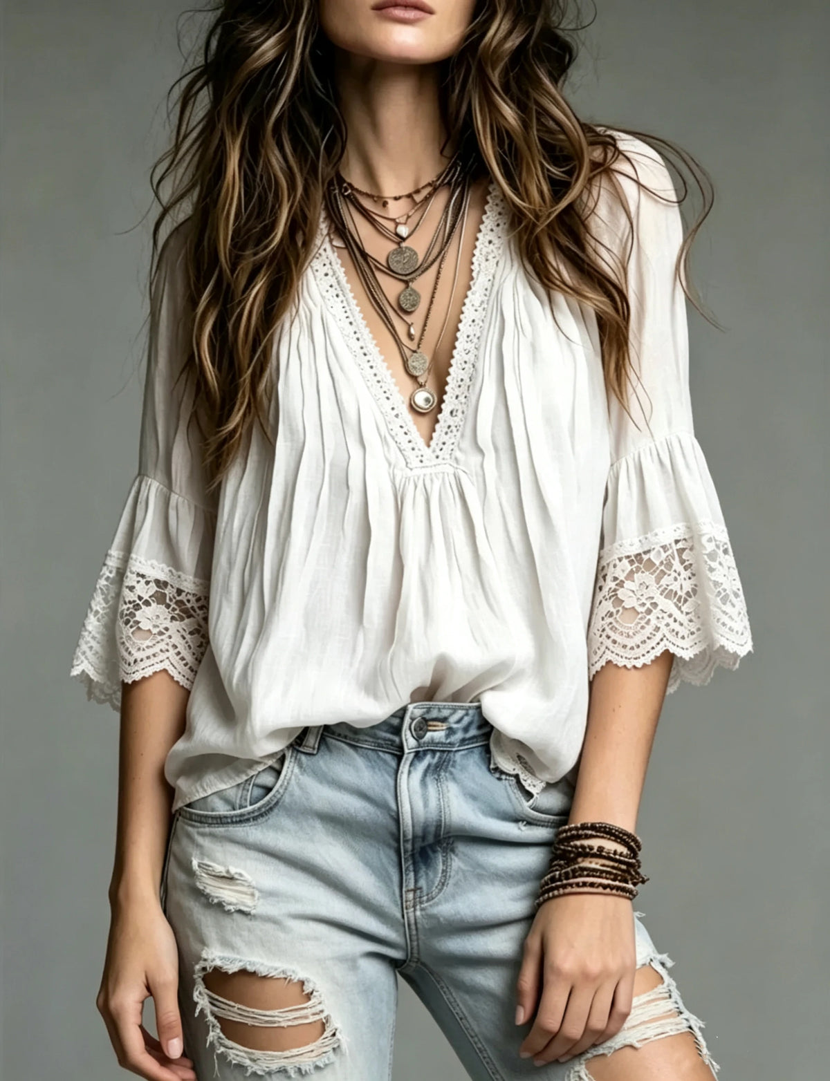 White bohemian V-neck blouse for women, European style, by Corporación Turística, displayed on a mannequin.