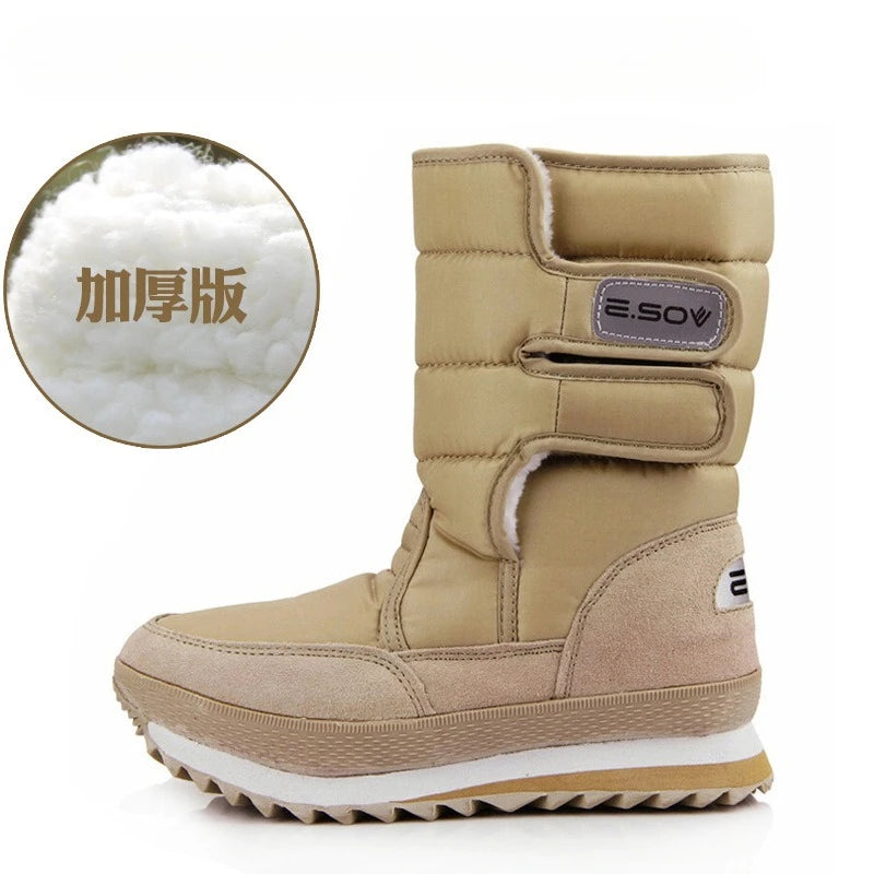 Thick winter snow boots for women by Corporación Turística, blue insulated waterproof footwear for cold weather.