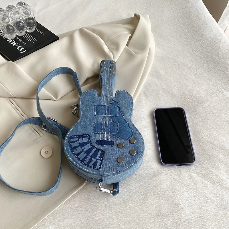 Blue denim crossbody bag for women from Corporación Turística, shoulder bag with adjustable strap and casual style.