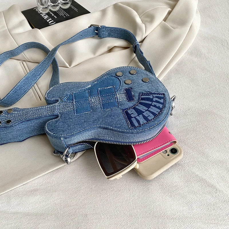 Blue denim crossbody bag for women by Corporación Turística, featuring shoulder strap and casual style.