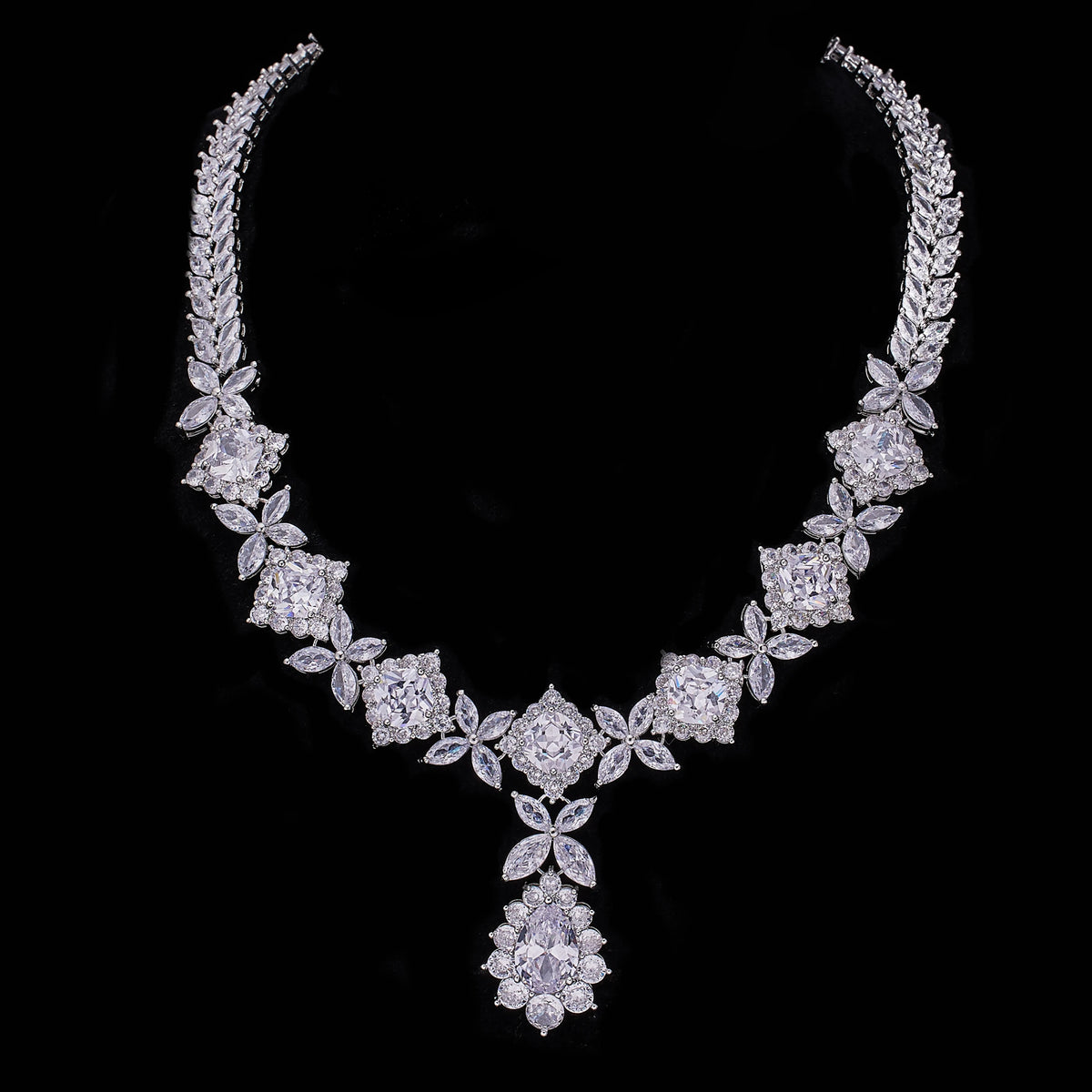 Blue and red wedding jewelry set with zircon stones from Corporación Turística, adjustable 45 cm chain, perfect for bridal accessories.