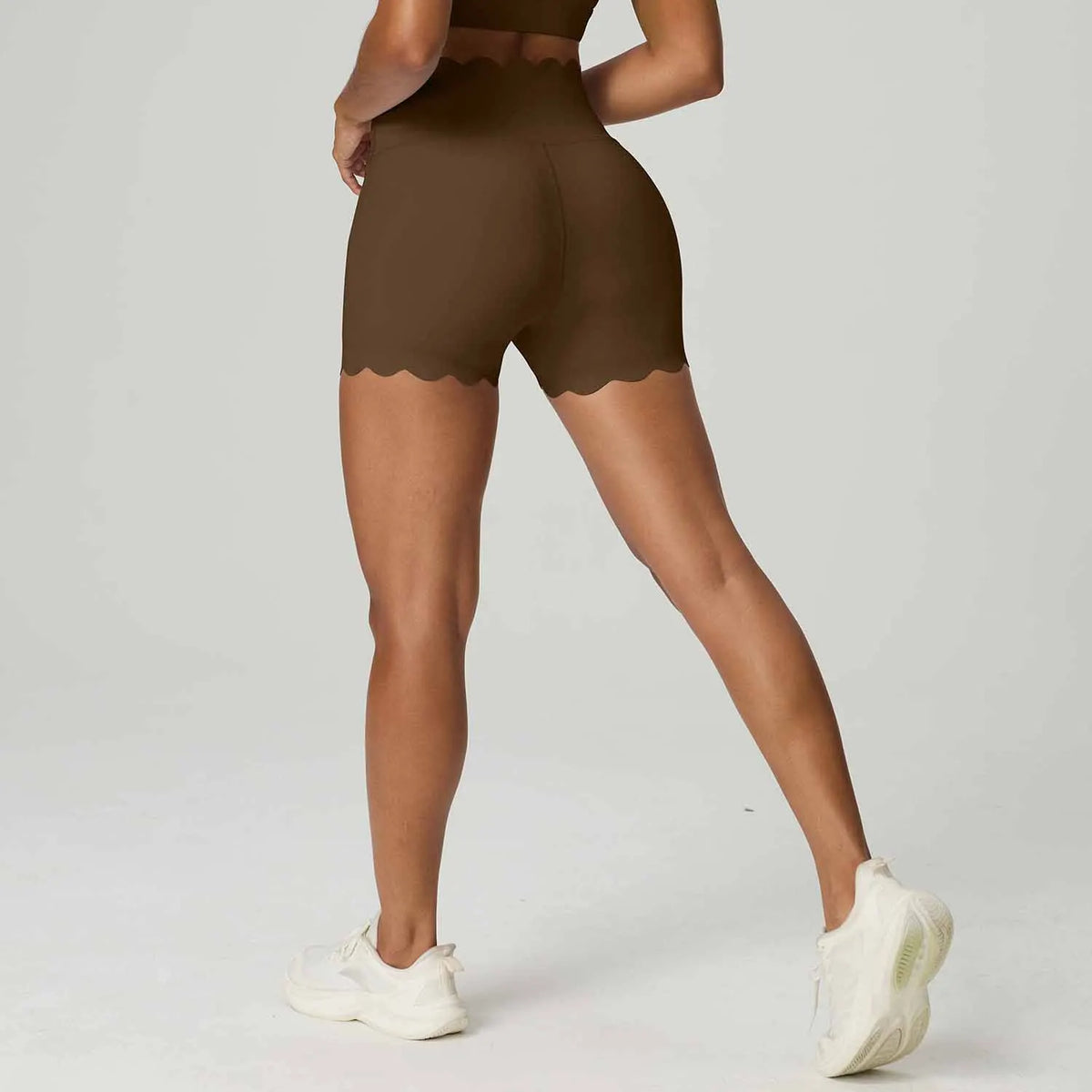 High-waisted women's yoga shorts by Corporación Turística in blue, designed for comfortable abdominal control and flexible movement.
