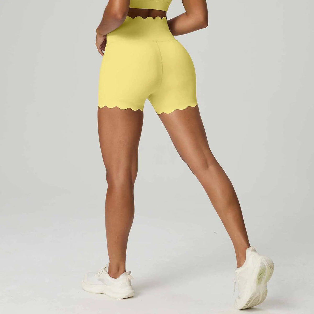 Blue high-waisted yoga shorts for women by Corporación Turística, featuring tummy control and comfortable stretch fabric.