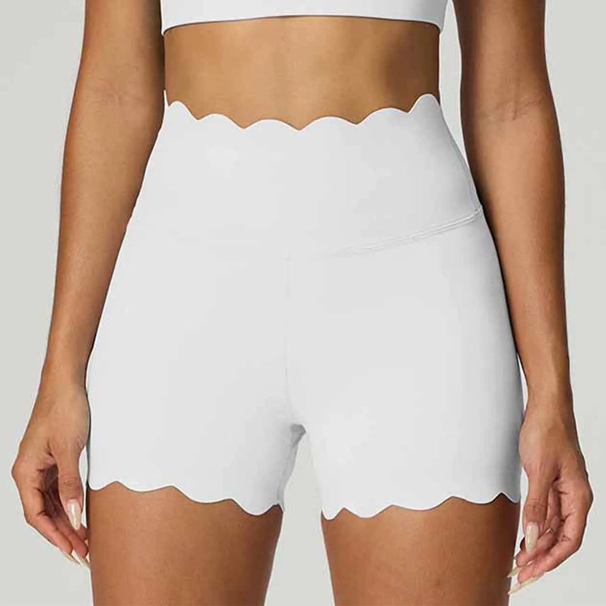 Blue high-waist yoga shorts for women by Corporación Turística, with abdominal control and comfortable stretch fabric.