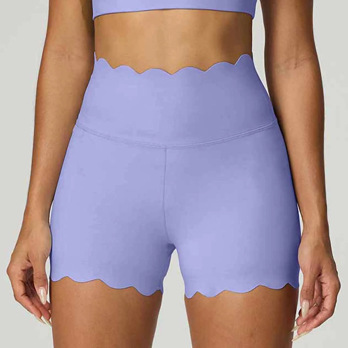 Blue high-waist yoga shorts for women by Corporación Turística, featuring tummy control and comfortable stretch fabric.