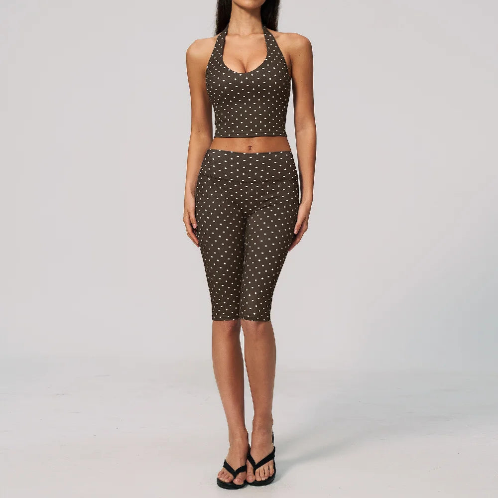 Blue and brown women's 2-piece sports set for yoga, featuring a fitted top and matching leggings from Corporación Turística.
