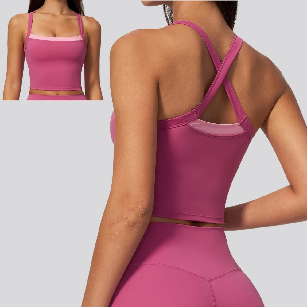 Blue women's two-piece sports bra by Corporación Turística, made for active wear, shown on a mannequin.