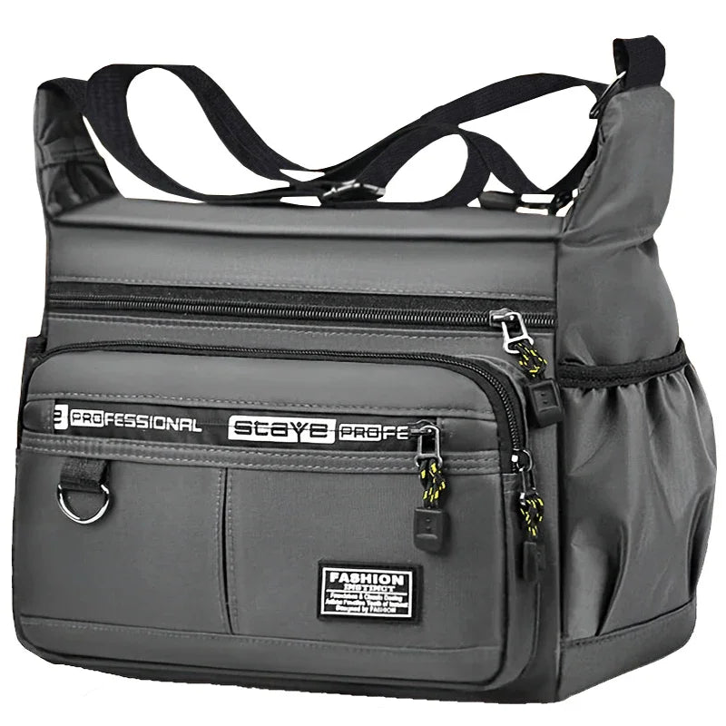 Black nylon men's shoulder bag with multiple layers, ideal for business travel, from Corporación Turística.