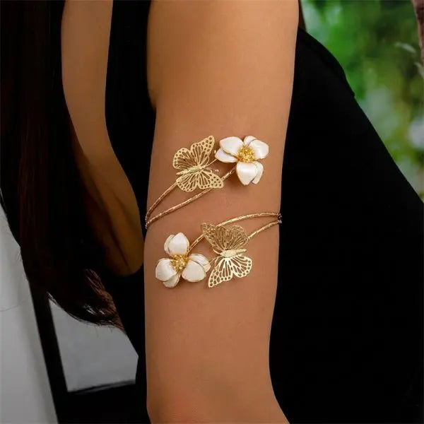 Open multicolored floral bracelet by Corporación Turística featuring hollow flower designs, vibrant and eye-catching.