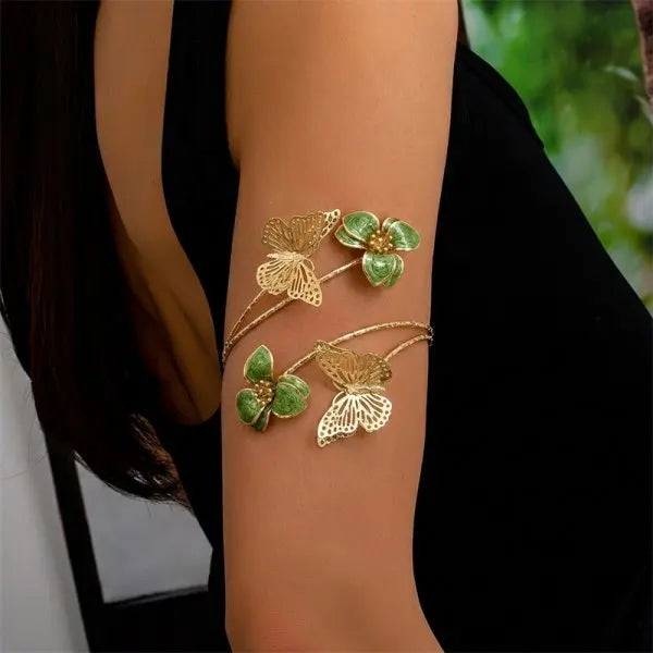 Open multicolored floral bracelet from Corporación Turística featuring hollow flower designs and vibrant colors.
