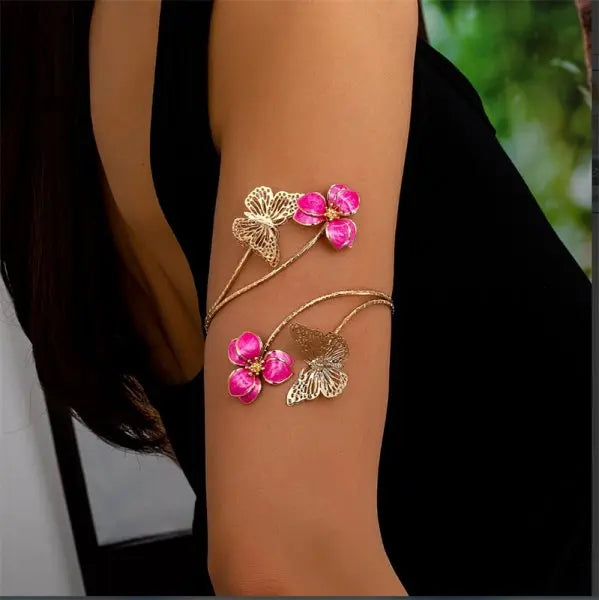 Open multicolored floral bracelet by Corporación Turística featuring hollow flower designs, vibrant and eye-catching jewelry.