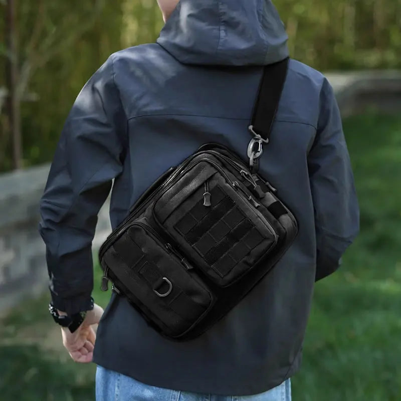 Brown tactical crossbody hiking bag from Corporación Turística with adjustable shoulder strap and multiple compartments.