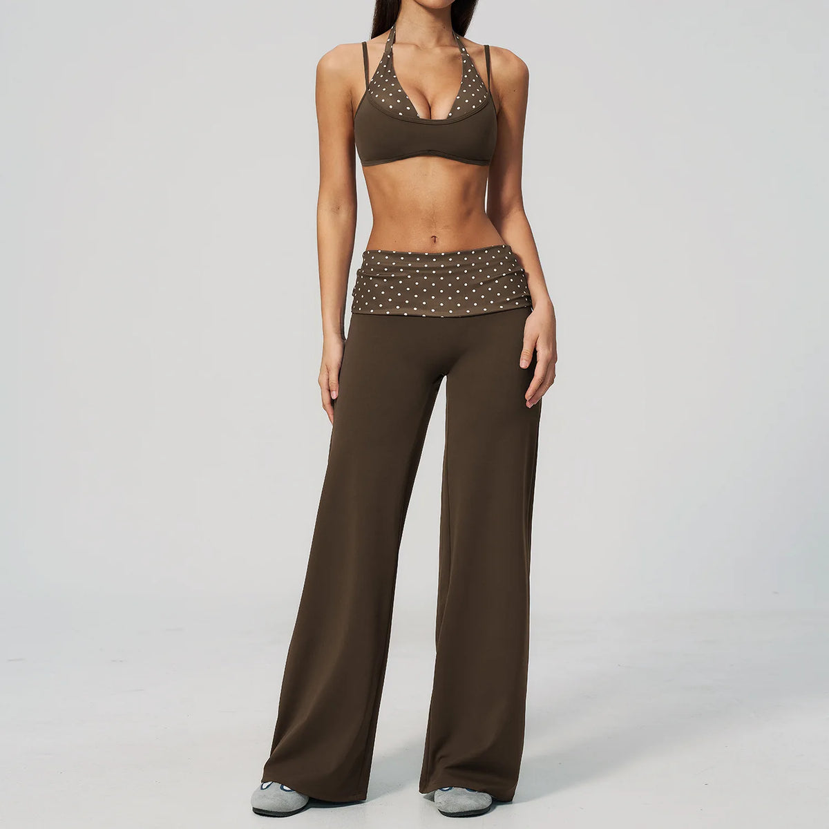 Brown polka dot 2-piece yoga set for women from Corporación Turística, includes sports top and leggings, comfortable athletic wear.