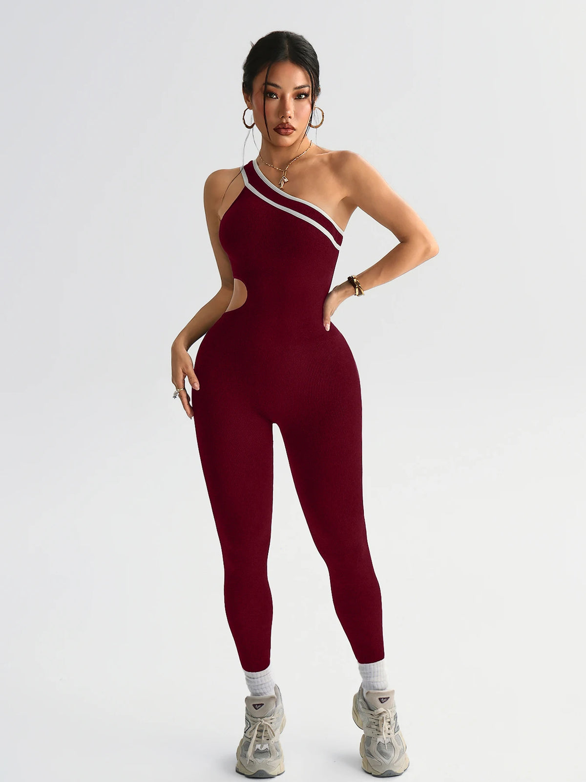 Brown seamless yoga bodysuit for women, athletic one-piece from Corporación Turística, designed for comfortable training and workouts.