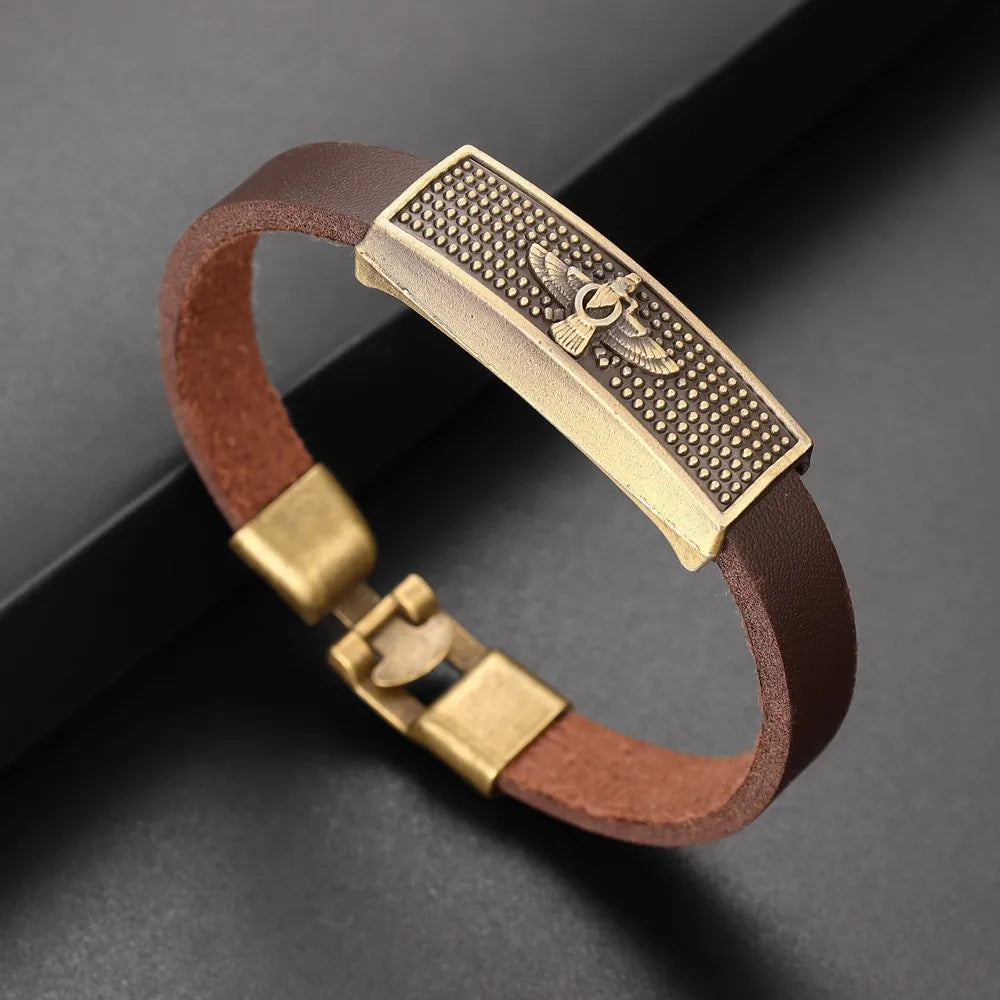 Vintage eagle bracelet with national emblem from Corporación Turística, brown leather strap featuring detailed eagle design.
