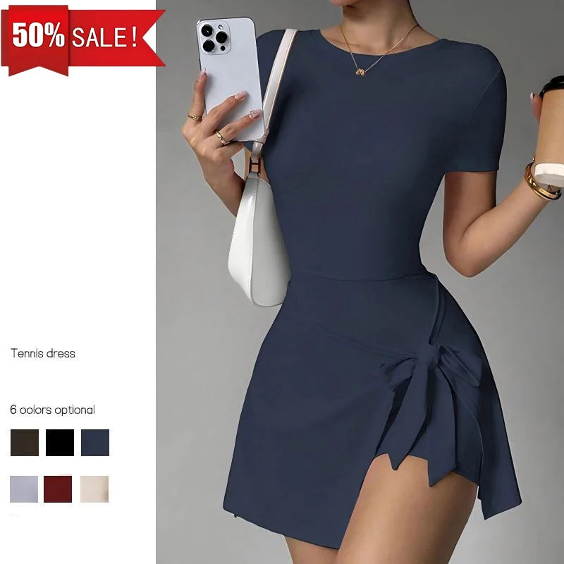Brown women's tennis dress with two-piece design and open back, by Corporación Turística, featuring sporty style and comfortable fit.