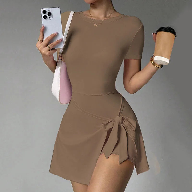 Brown women's tennis dress with two-piece design and open back, from Corporación Turística, suitable for sports and casual wear.