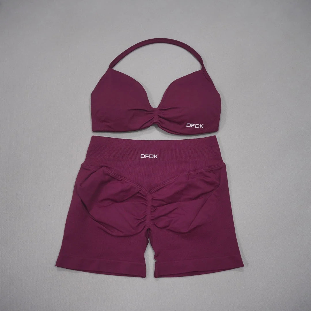 Brown women's 2-piece sports set from DFDK by Corporación Turística, includes a comfortable sports bra and matching shorts.