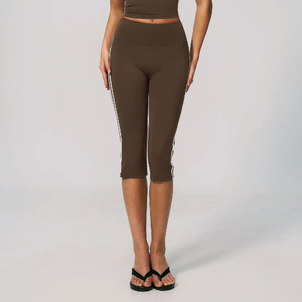 High-waisted women's athletic shorts by Corporación Turística, designed for cycling, in burnt coffee color with a comfortable fit.