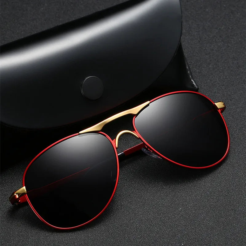 Classic polarized sunglasses for men by Corporación Turística with black frames and dark tinted lenses.