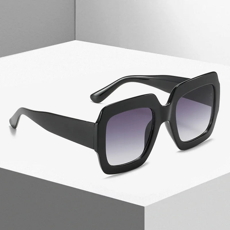 Large square leopard-print brown sunglasses by WOWSUN, stylish oversized eyewear, designed for a bold fashion statement.