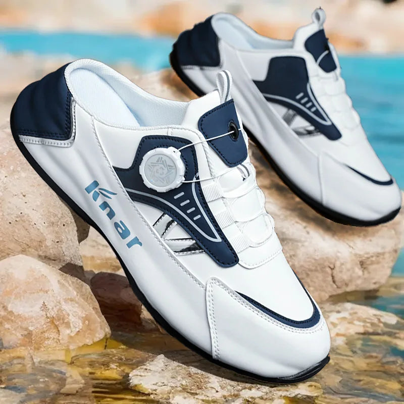 Casual men's sports shoes by Corporación Turística, lightweight and breathable design, in black with white soles.