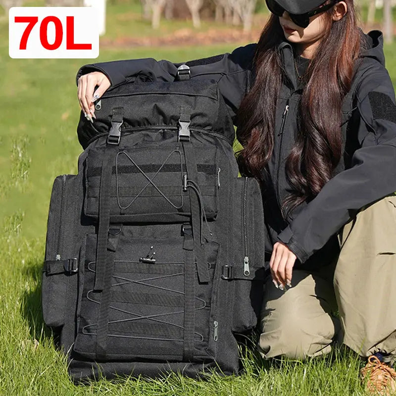 Large Corporación Turística tactical camping and climbing backpack with camouflage design, multiple compartments and sturdy straps.