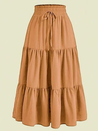 Khaki medium-length elastic high-waist skirt by Corporación Turística, shown on a model with a fitted style and soft fabric.