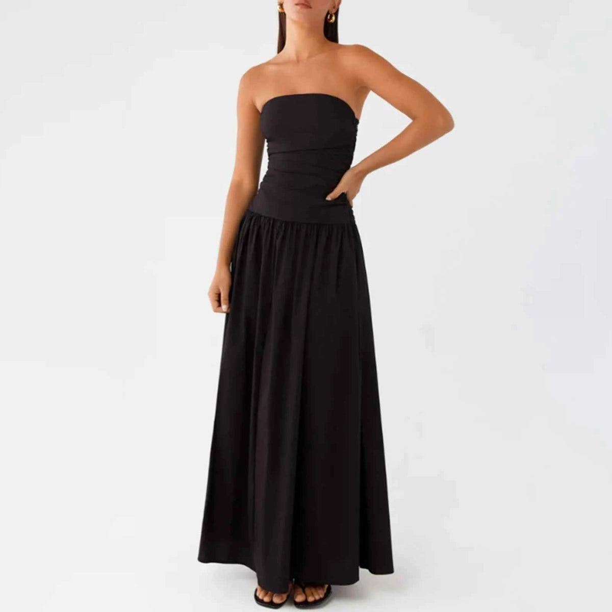 Elegant long sleeveless dress for women in caqui by Corporación Turística, showcasing a stylish, flowing design.